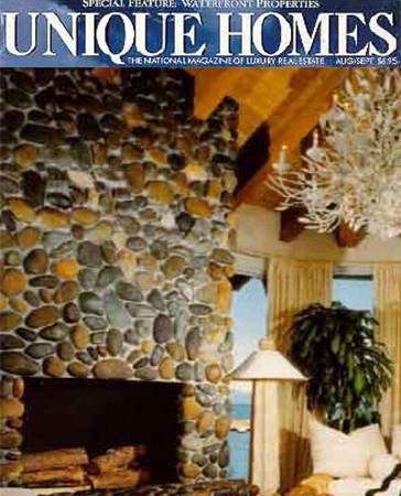 Fleur Du Lac River Rock Fireplace.  Featured In Unique Homes Magazine